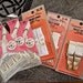 6 Packages of Vintage Garters, Buckles and Shoulder Straps Notions OOAK