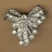 vintage clasp art deco three strand bow rhodium plated unusual style and its also a brooch
