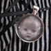 Halloween jewelry Creepy vintage doll necklace Pendant Silver circle babydoll photograph