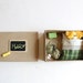 Doll in box. Miniature.