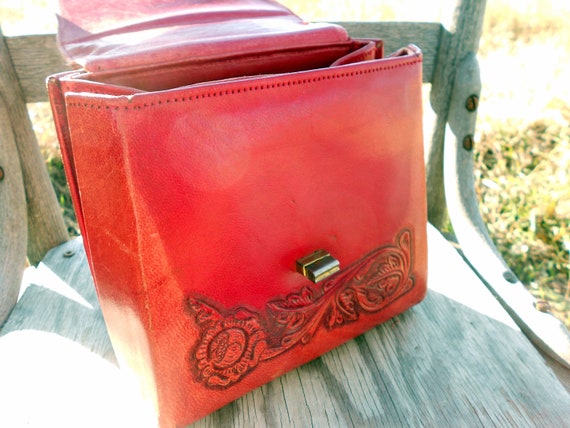 red tooled leather purse