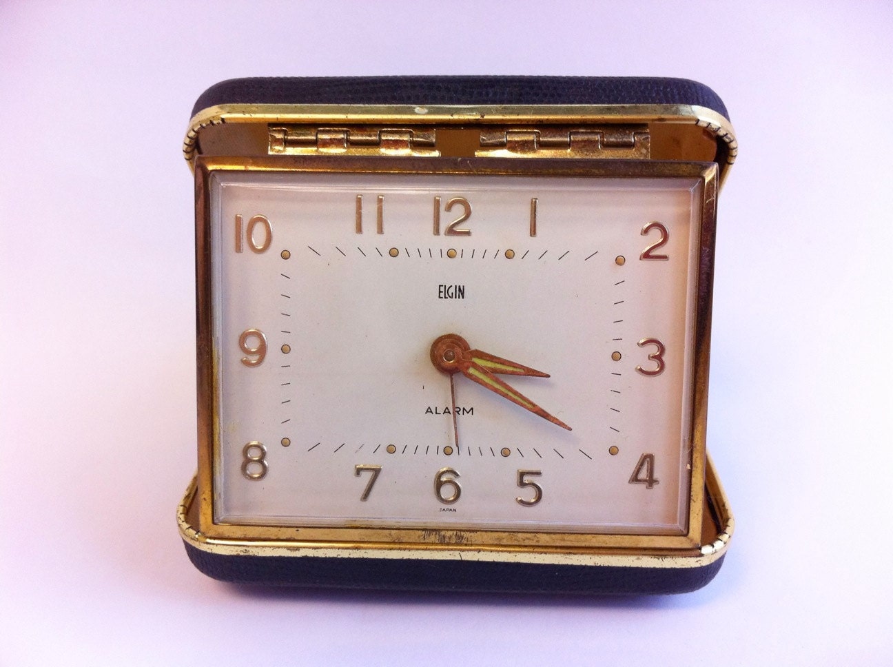 Vintage Elgin travel alarm clock. Black case. Works.