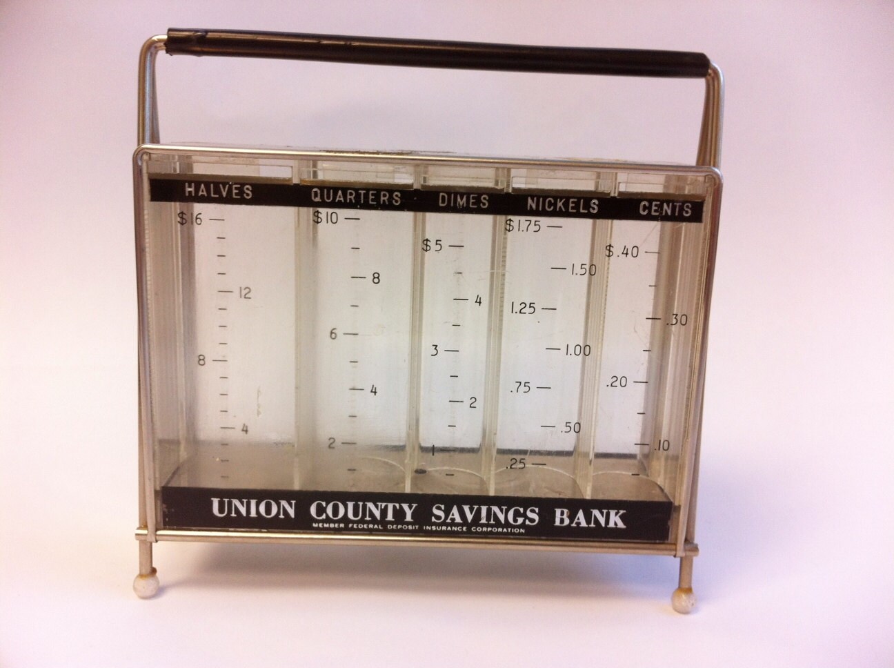 Vintage metal coin stacking bank. Promotional by AllisonKapner