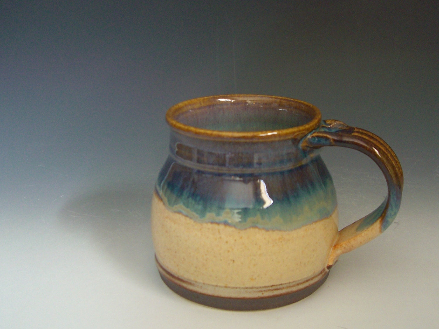 Hand thrown stoneware pottery travelers mug