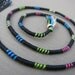 Trance - Black Hair Wrap Extension Atebas Dread Fall with neon swirls