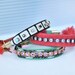 Reserved for louisebeez33 Vintage silk black white and coral bracelet. Please don't buy.