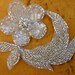 Cute embroidered and beaded flower applique with sequins