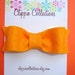 Wool felt bow clippie - light orange hair clip - no slip grip