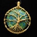 Tree of Life wire wrapped pendant with blue and green stone