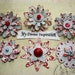 Light Blue Silver and Red Scrapbook Paper Embellishments and Paper Flowers