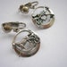 Silver tone metal dangle Horse pattern clip on earrings