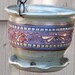 Hanging Planter With Flowers, Dragonflies, And Swirl Design