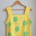 1960s HOT AIR BALLOON Vested Gentress Dress.....size medium to large.....60s dress. designer vintage. kitsch. mod. birds. balloon. yellow.