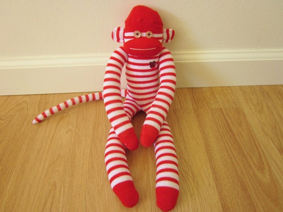 red and white striped sock monkey