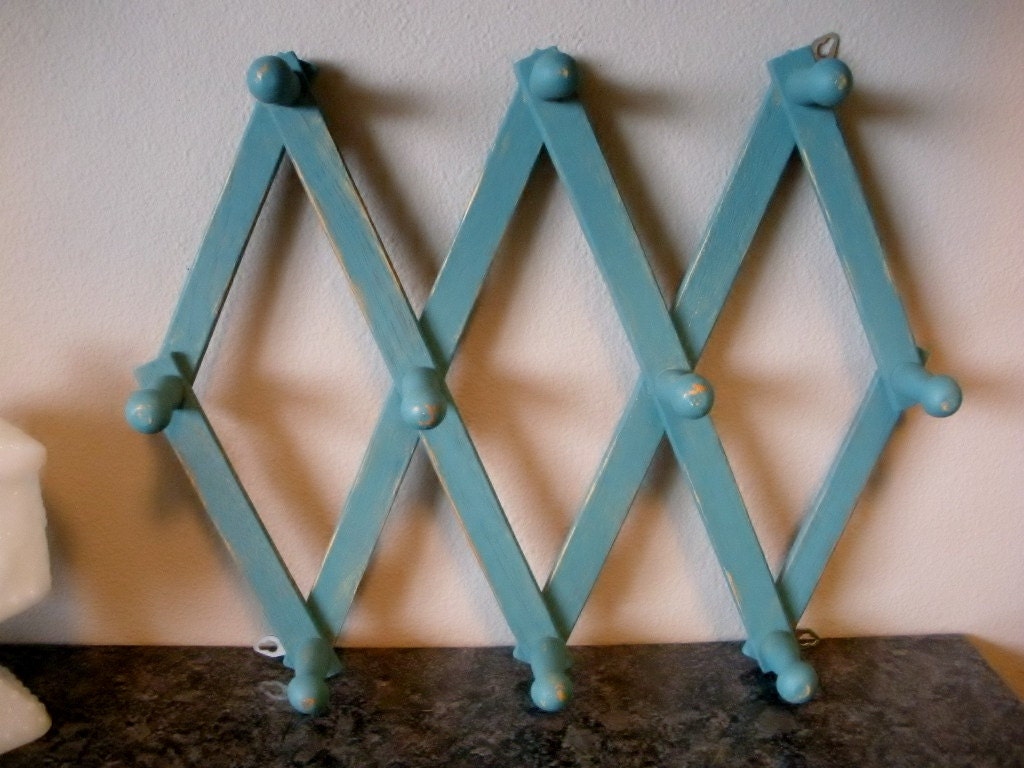 Folding hanging accordion style wood peg rack coat wall rack