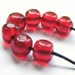 Red handmade lampwork beads - set of 7 curvy cube lampwork beads