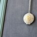 Cream Bloom Silver Locket Necklace