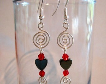 View Earrings Pierced by WolfandFirefly on Etsy