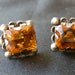 Vintage screwback Mexican silver and citrine color glass earrings. 1940s or earlier.