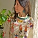 Dancing Rainbow Figures Sweater