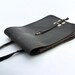 Vintage leather messenger bag from the 60s - black color