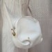 Vintage Etienne Aigner handbag purse Crossbody soft white leather and brass hardware with adjustable buckle strap