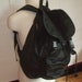 Vintage black leather backpack rucksack drawstring distressed 80s