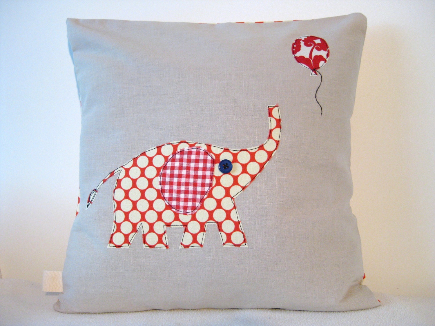 red elephant cushion