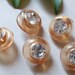 NOS Vintage Clear Peach Plastic Shank Buttons With Rhinestone Centers--lot of 5
