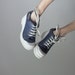 Blue denim wedge platform sneakers