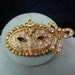 1928 co Jewelry Rhinestone Mask Pin