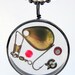 Gone Fishing Pendant - Hook, swivel, weight, etc. encased in resin with black open back bezel