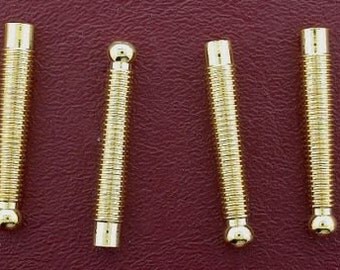 Two goldplated heavy cast bolo bola tips cf572