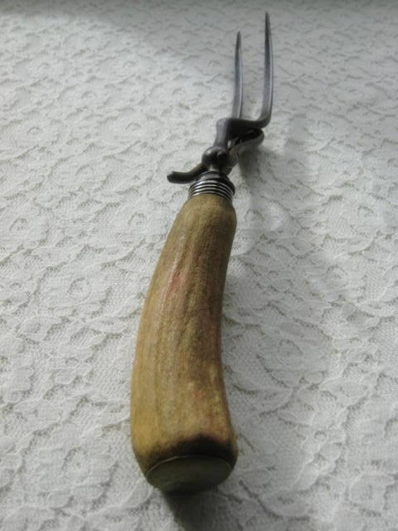ON SALE vintage horn handled carving fork with stand