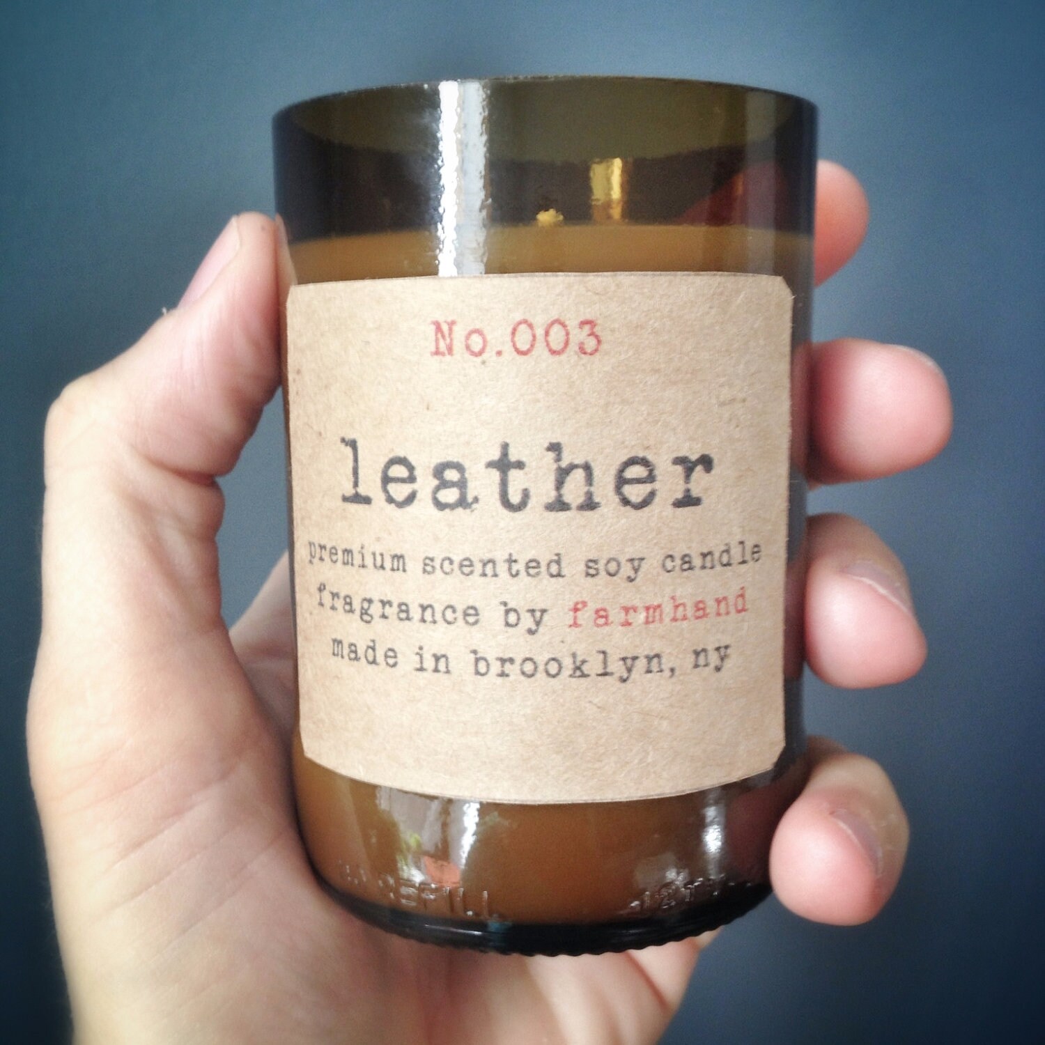 Leather Scented Ecofriendly hand poured 6oz soy candle in a