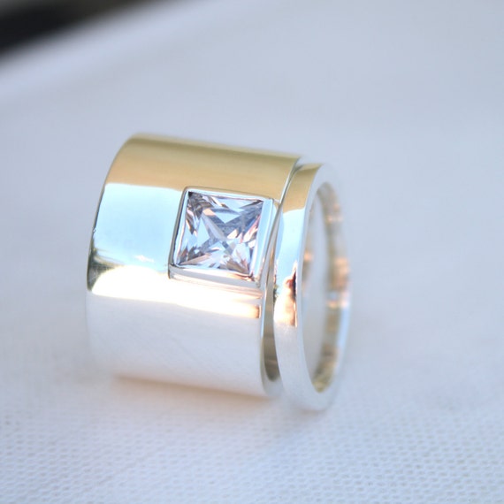 Next unusual diamond ring designs for women for 4 stones street
