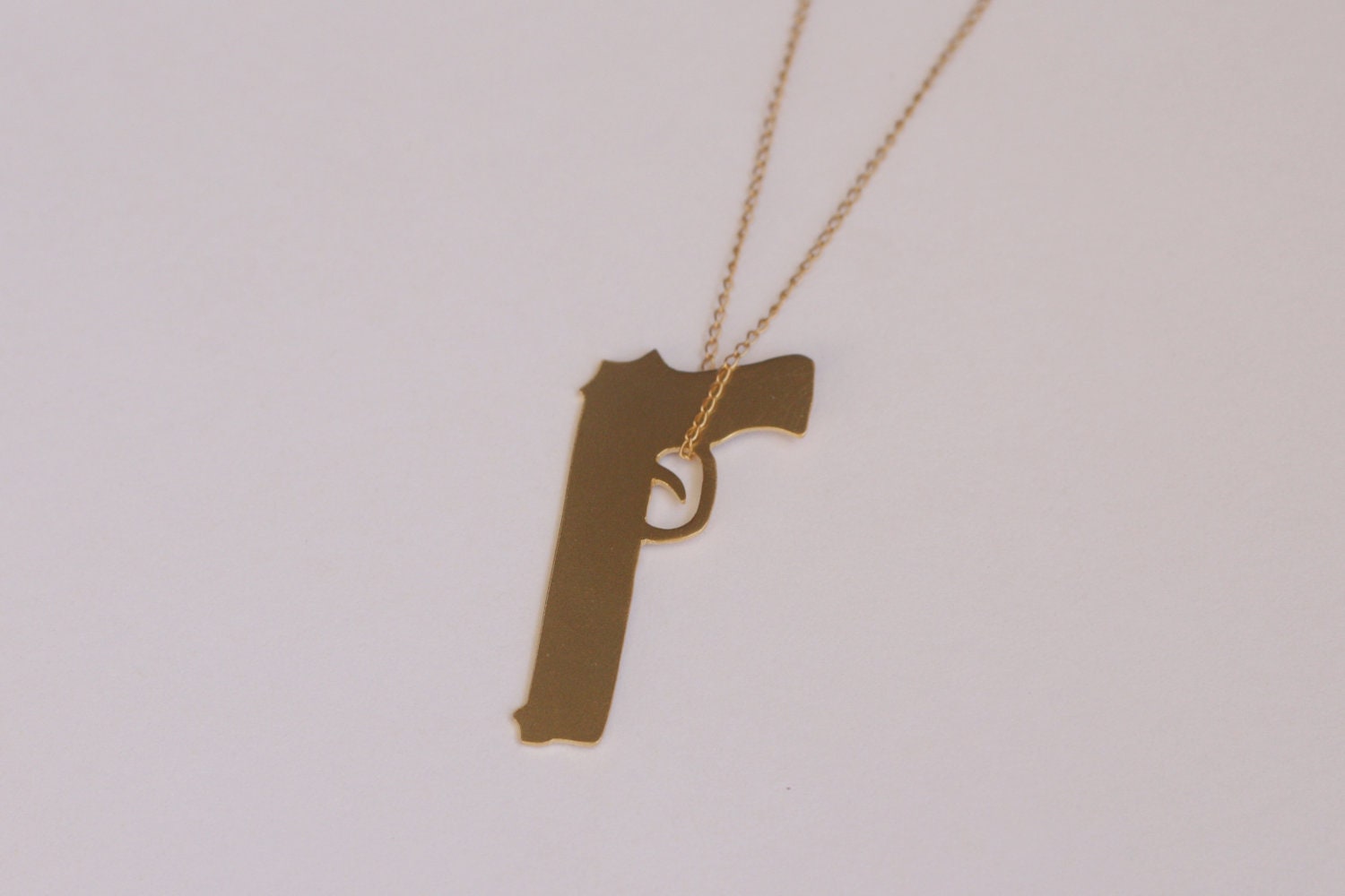 Items similar to Gun Necklace, Weapon Jewelry, Gold Soprano Charm, Gun