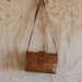 1970s rustic TOOLED carmel colored leather purse