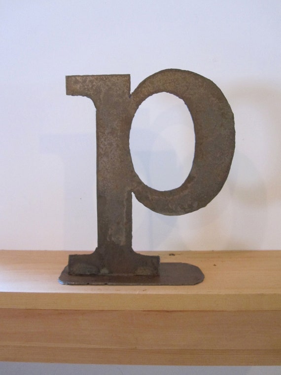 Items similar to Lowercase metal letter "p" on stand on Etsy