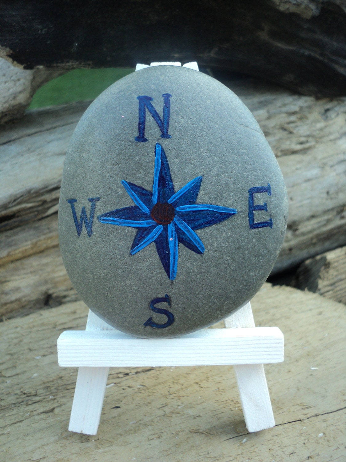 Compass rose in nautical motif hand painted on Lake Erie beach