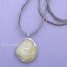 Rustic Stone Necklace, Rune Engraving on a tan stone, Kenaz, Engraved Rune Symbol Pendant Necklace, Artist Gift, handmade jewelry
