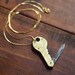 Antique Figural Mother of Pearl Key Shaped Pocket Knife Necklace