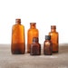 5 Vintage Amber Bottles Apothecary Hoppes McKesson Industrial
