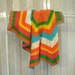 Vintage crochet afghan blanket, trapezoid stripe design, bright colors