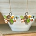 A basket of posies. floral bouquet earrings. Tiedupmemories