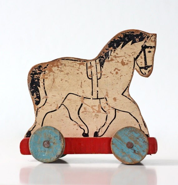 vintage toy horse on wheels