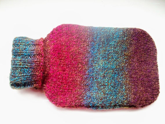 Fun hot water bottle and hand knitted knit cozy by SpinningStreak