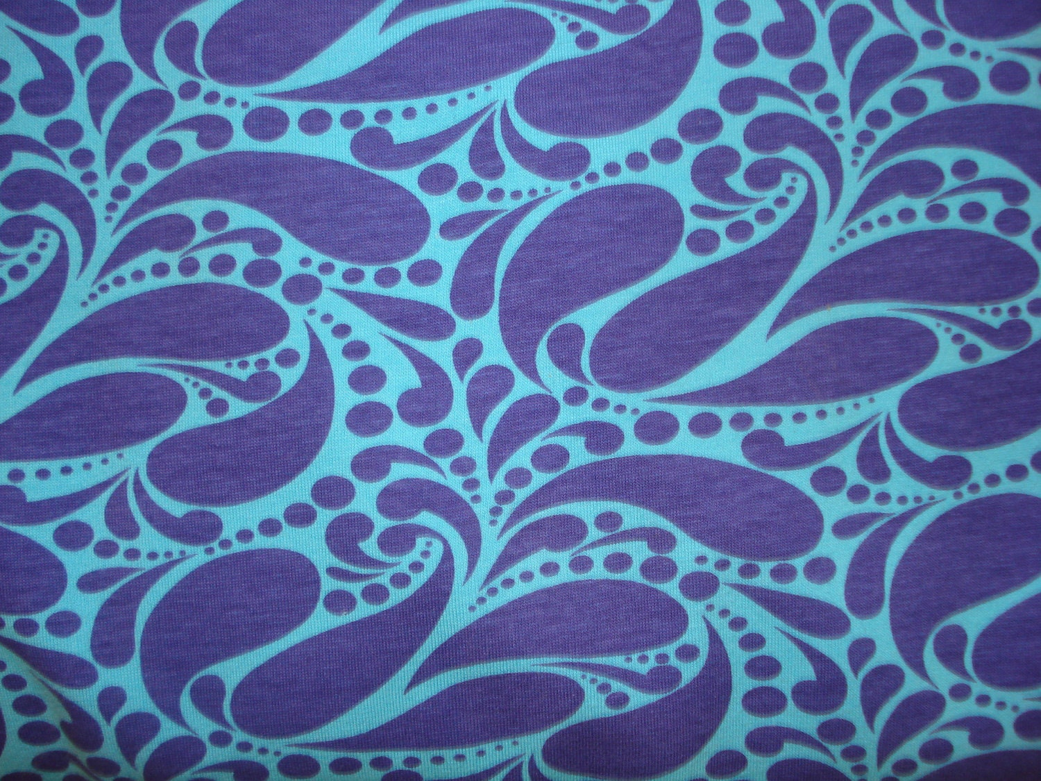 Purple paisley on turquoise Cotton Lycra knit fabric 1 YD