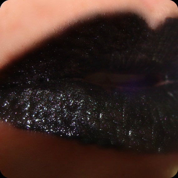 Elvira ..Lip gloss Opaque Black lip gloss with by moiminerals