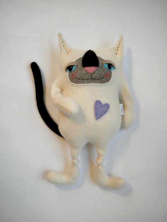 stuffed siamese cat